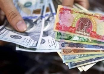 مجموعة دولارات في العراق
