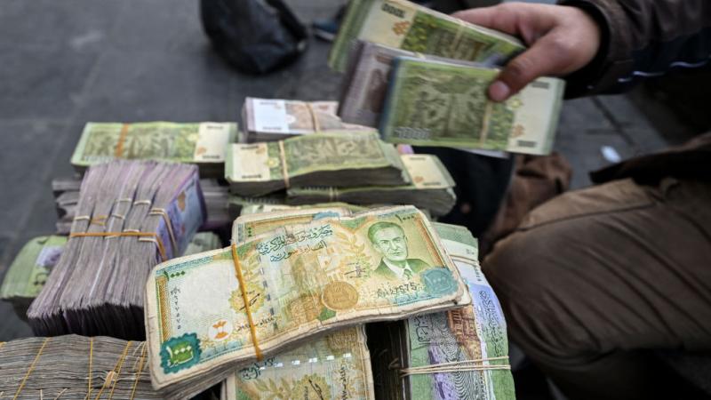 استبدال الليرة السورية